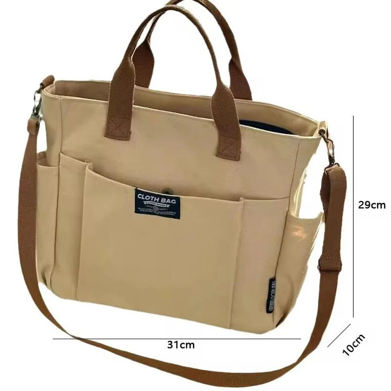 Urban minimalist portable student handbag, horizontal canvas, large capacity, one-shoulder diagonal crossbody bag.