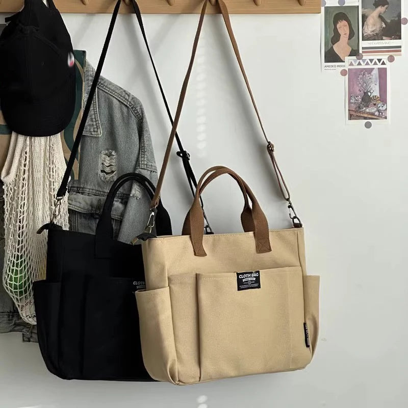 Urban minimalist portable student handbag, horizontal canvas, large capacity, one-shoulder diagonal crossbody bag.